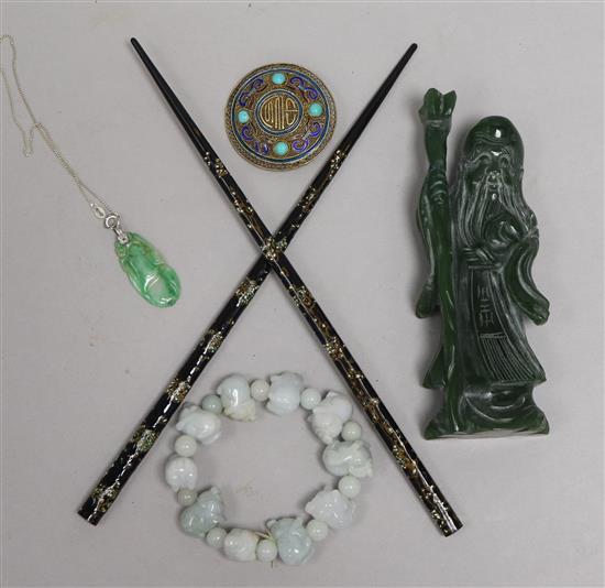 A Chinese carving, bracelet, 2 pendants and a pair of chop sticks